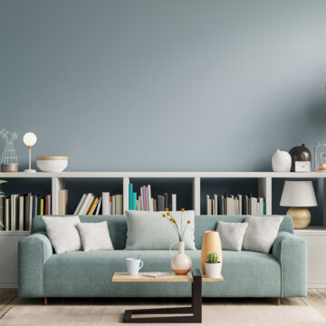 Sofa in the library for reading is located at the back of the living room,which has a blue wall. Reading with Blue Background