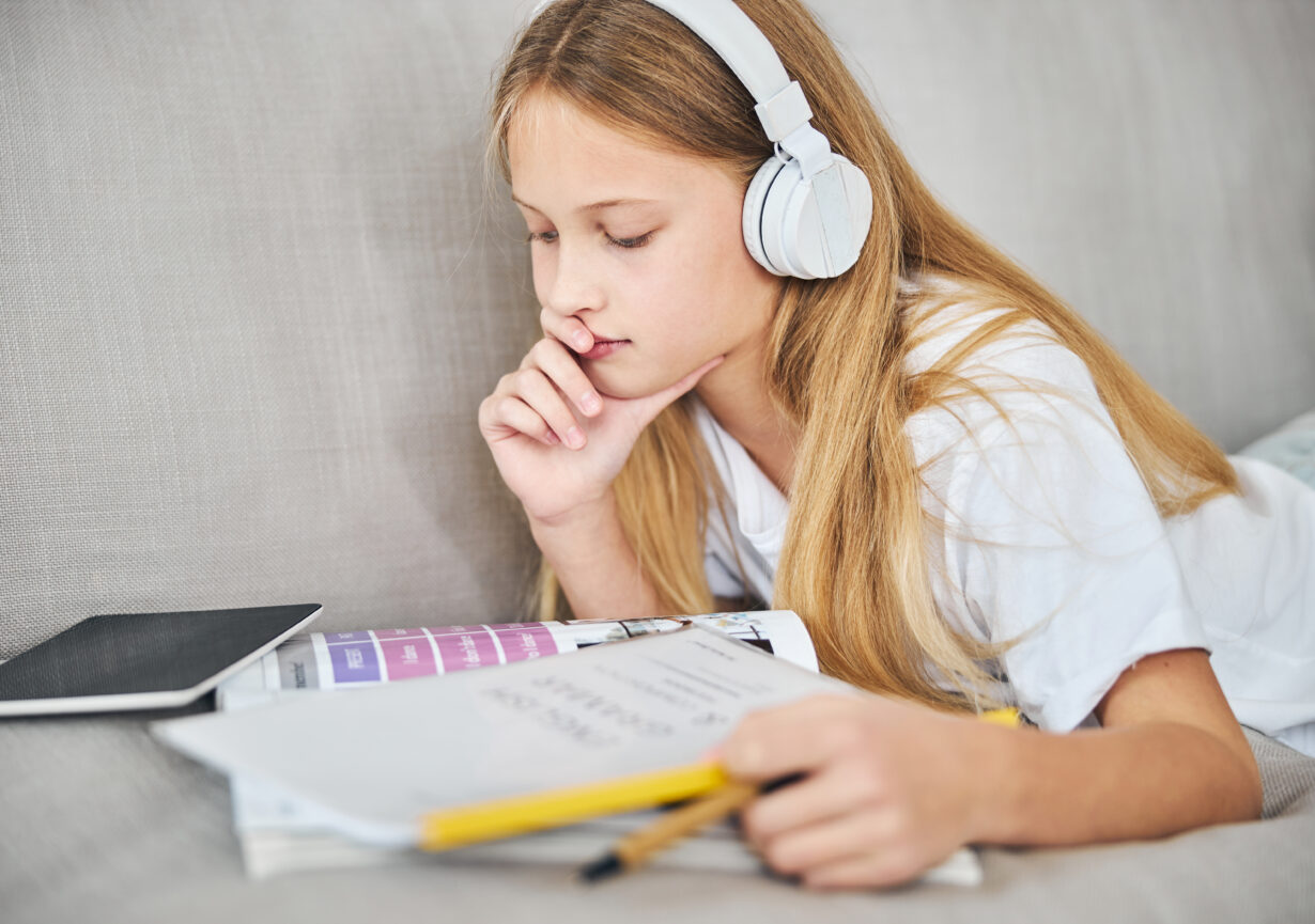 Thoughtful student keeping the hand on her chin Transition Words